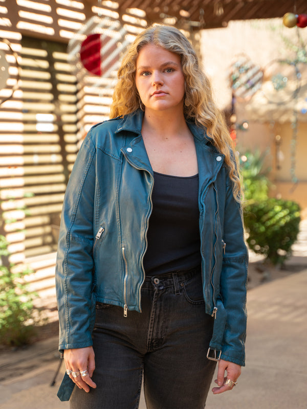 Conscious Coterie Wild Leather Jacket in teal on model main editorial image