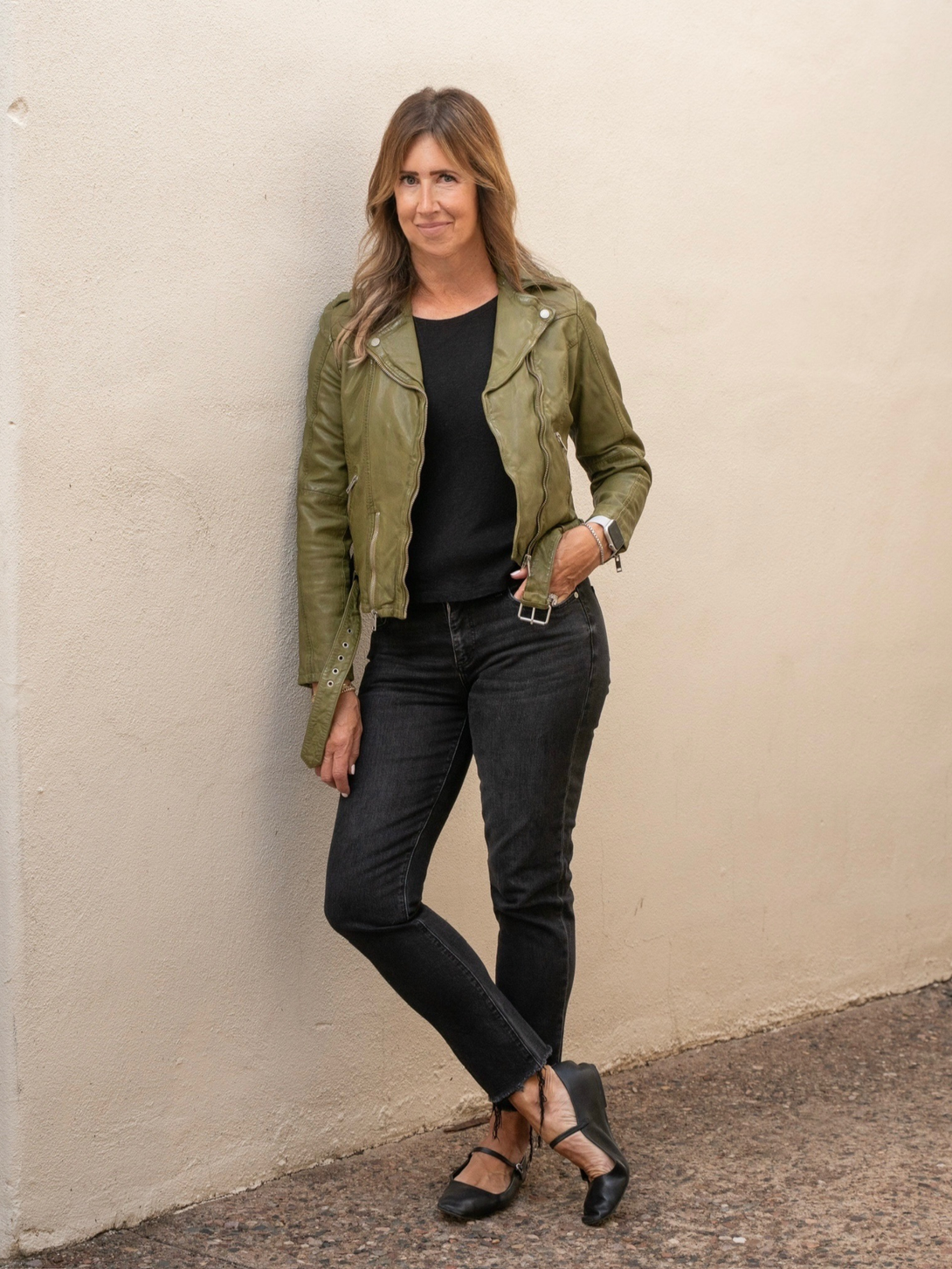 Conscious Coterie Wild Leather Jacket in olive full body photo on woman showing front view of jacket