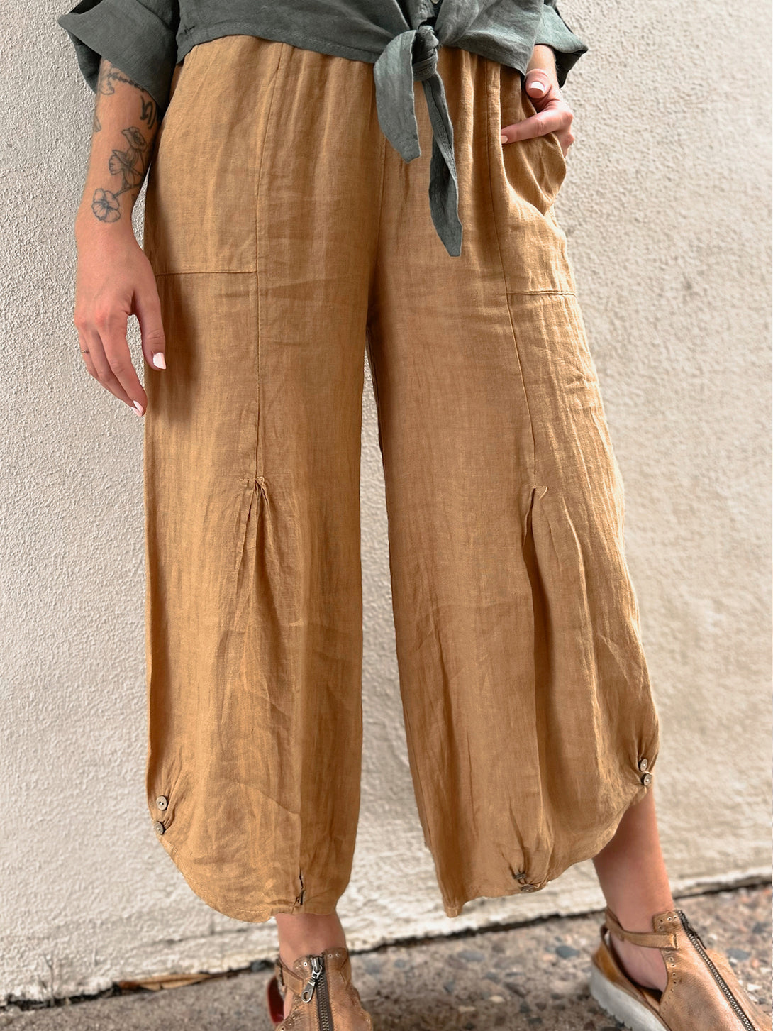 Conscious Coterie Yoli Pant in Camel on model front detail view