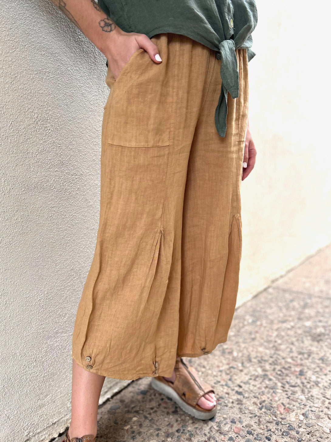 Conscious Coterie Yoli Pant in Camel on model front side detail view