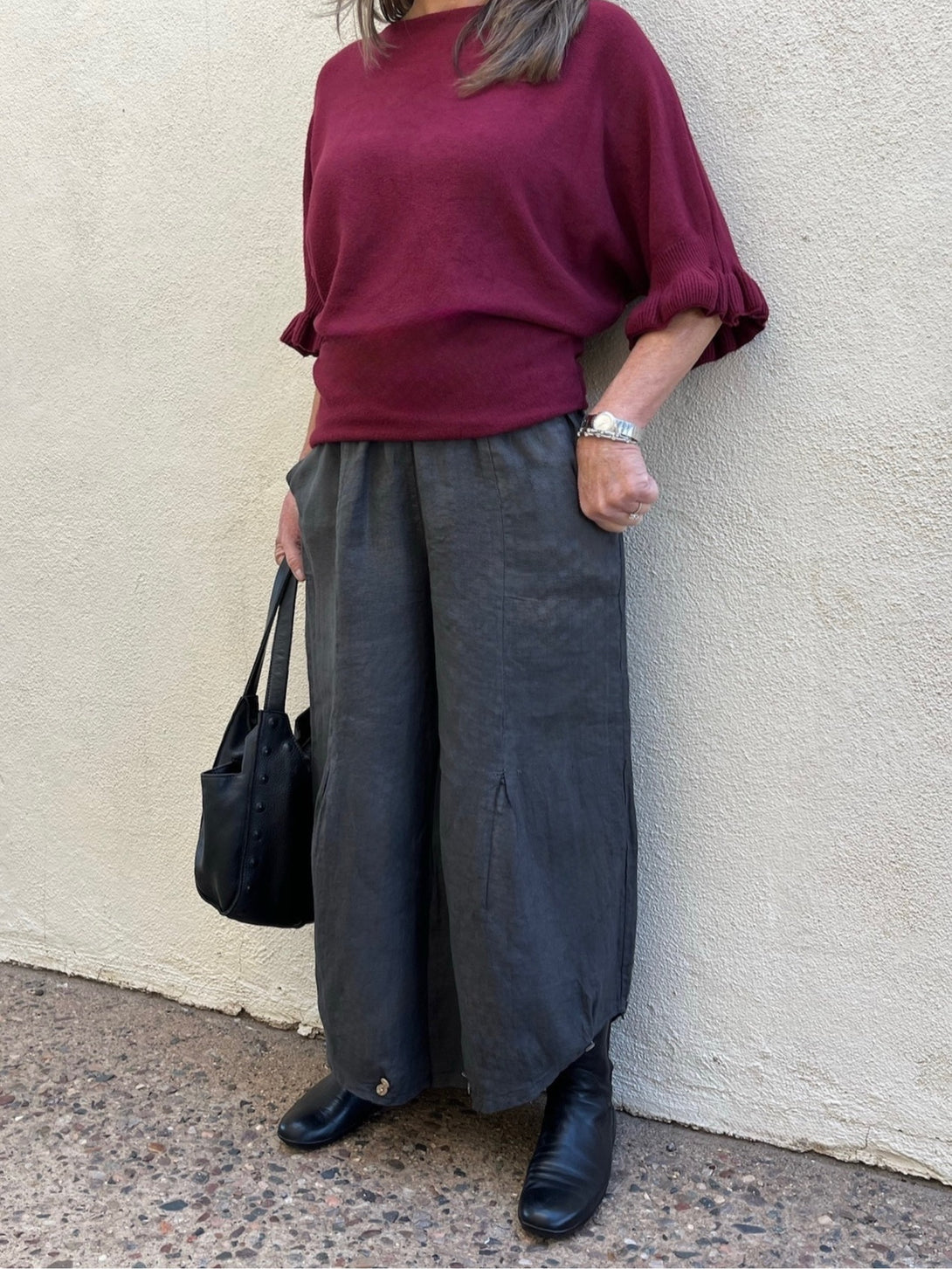 Conscious Coterie Yoli Pant in Charcoal front close up view of the wide leg pants 