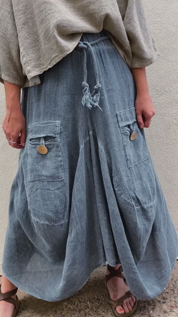 Product video for the Quincy Skirt in navy by Conscious Coterie