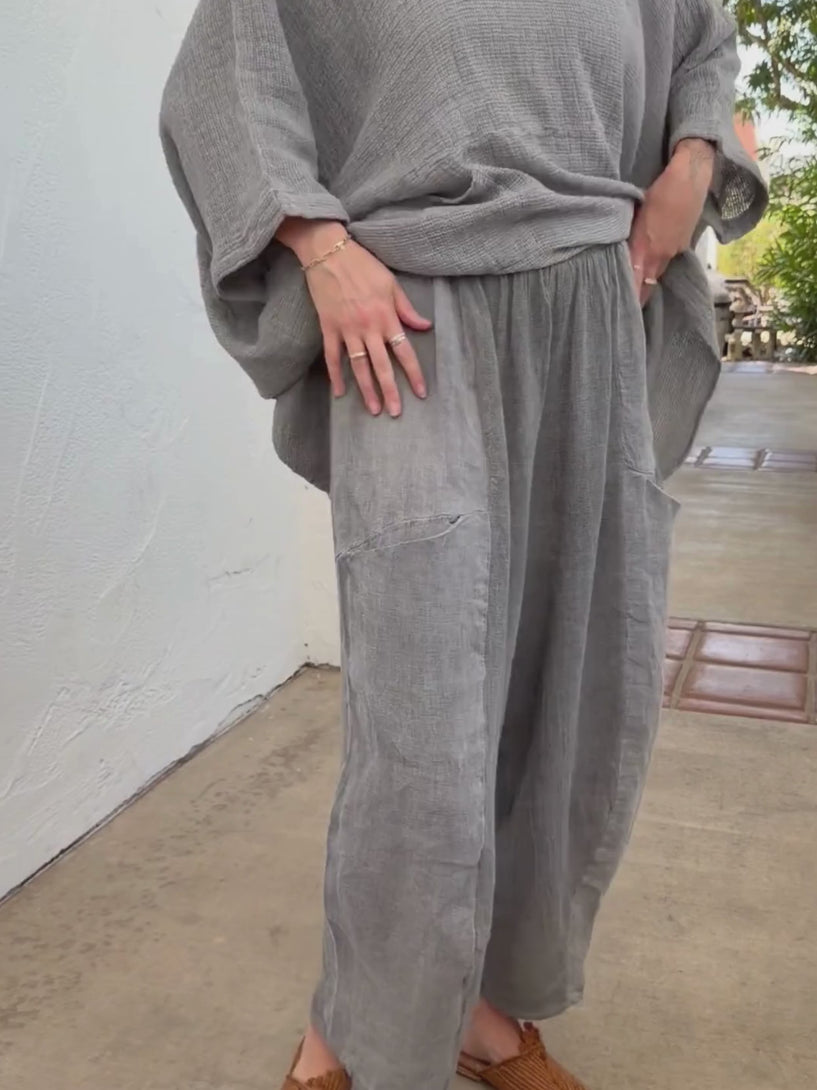 Conscious Coterie Michelle Pant in charcoal video of woman wearing pant showing all angles in them moving around