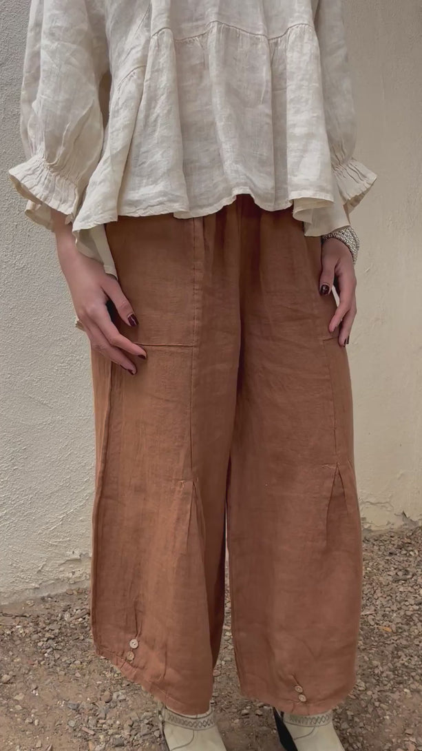 Conscious Coterie Yoli Pant Brown video showing pant details on woman