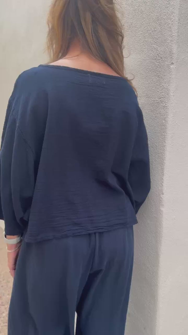 Conscious Coterie Rosie top in navy blue video of model wearing top showing all angles