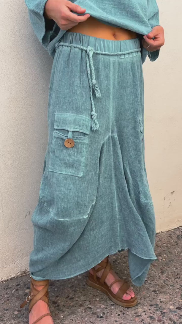 Product video of the Quincy Skirt in teal by Conscious Coterie