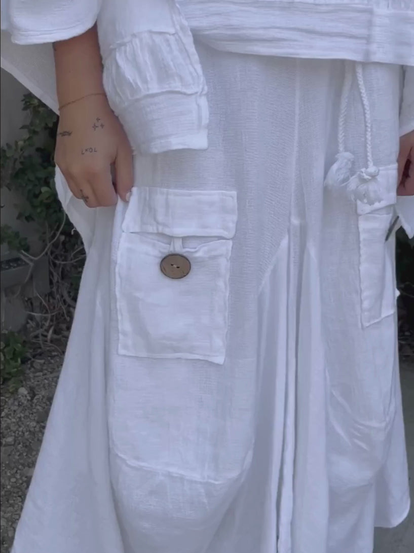 Conscious Coterie Quincy skirt in white video of woman wearing skirt showing all views of skirt