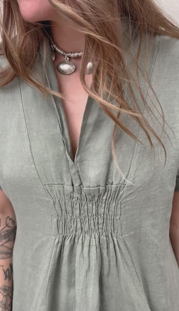 Product video for the Kimmie Dress in olive by Conscious Coterie