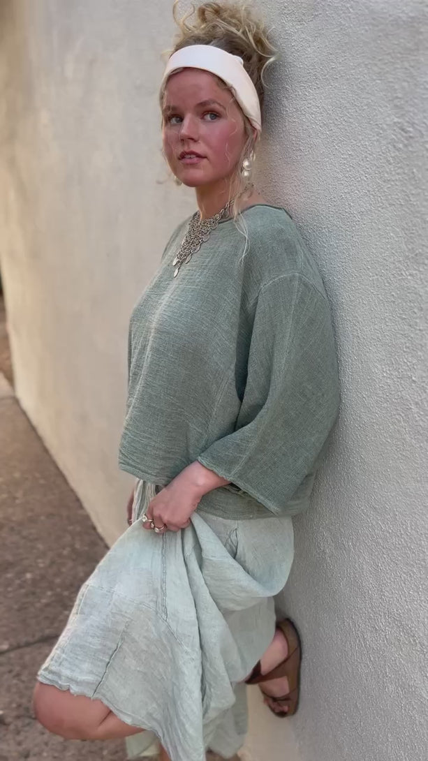 Product video for the Rhonda Top in olive by Conscious Coterie