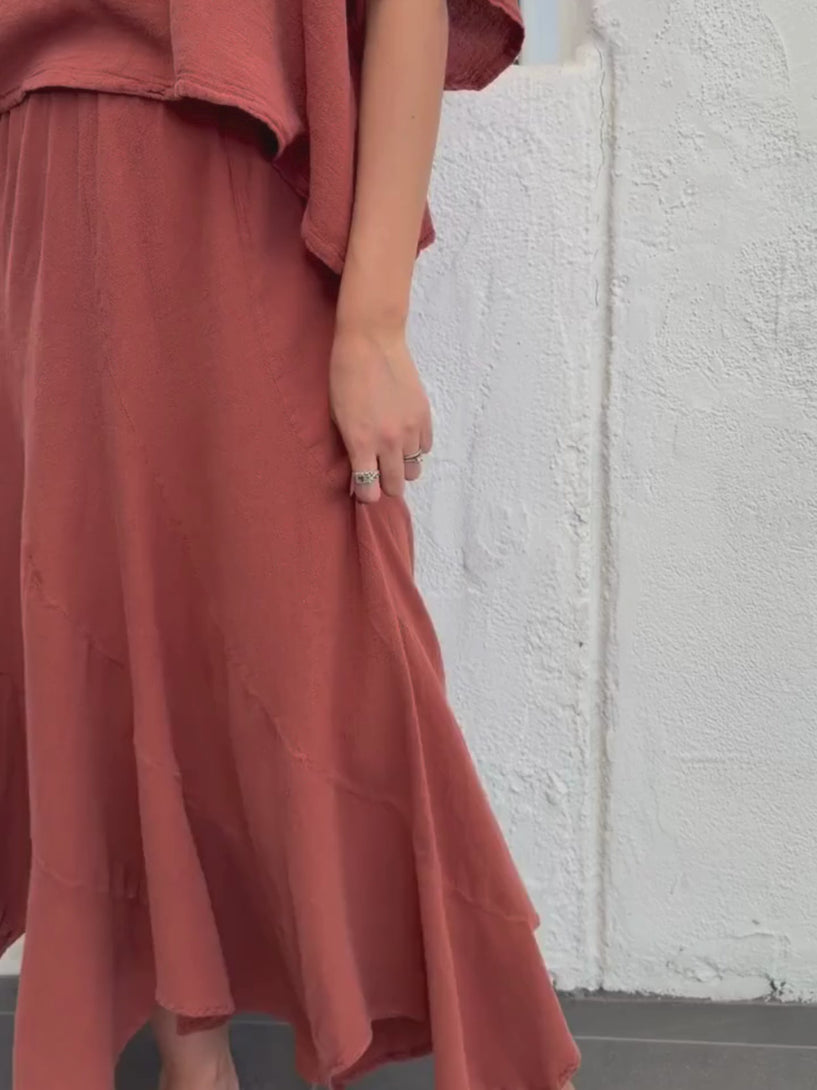 Conscious Coterie Sutton Skirt in Terracotta video of woman wearing skirt showing it moving